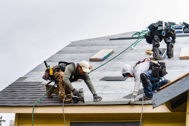 Professional Gutter Installation technician working in Brookston, IN